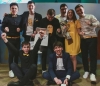 "Caucasus above the sky" - this is about Club of the Funny and Inventive (KVN), "Funny team" - about "The very guys" 