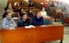 Curators of academic groups are sitting at the desks